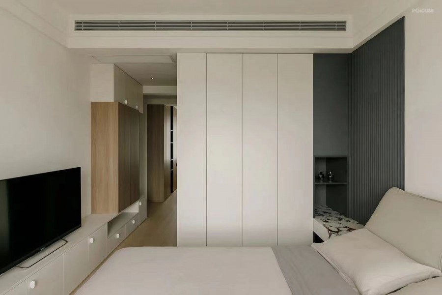 現(xiàn)代奶油風三居室臥室裝修效果圖