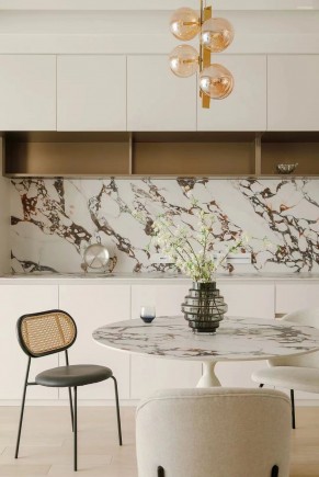 現(xiàn)代奶油風三居室餐廳裝修效果圖