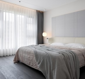 現代簡約三居室裝修臥室效果圖